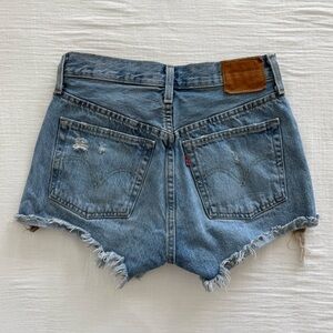 Vintage Levi’s 501 distressed cut off denim shorts